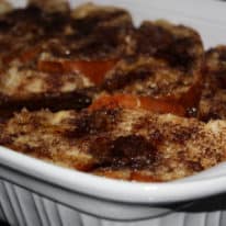 Overnight French toast casserole in a white baking dish