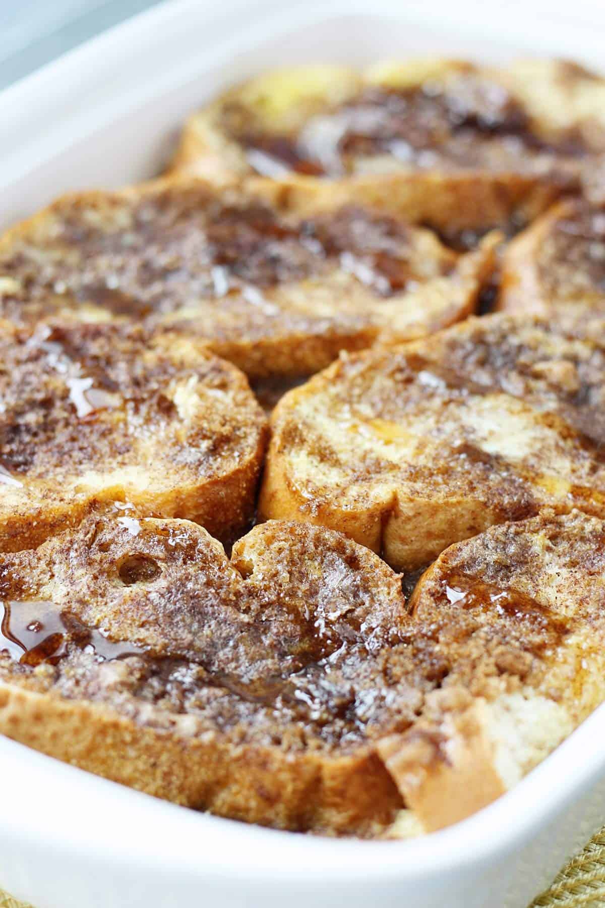 Overnight French Toast Casserole in a white baking dish.