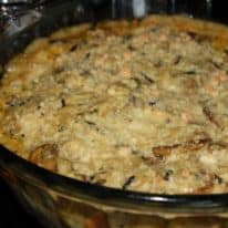 Chicken and wild rice casserole in a glass baking dish