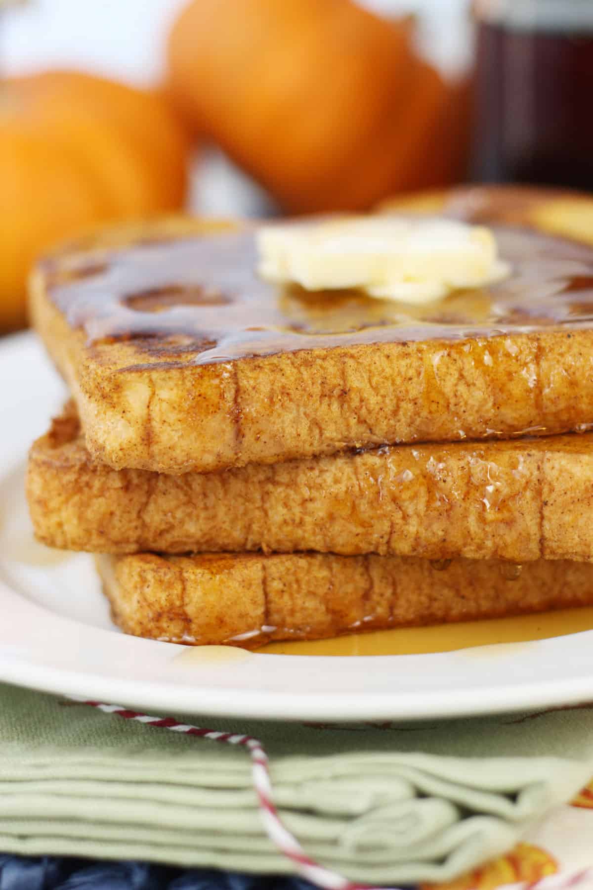 A stack of Pumpkin French toast on a plate.
