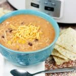 Crockpot chicken taco soup in a blue bowl.