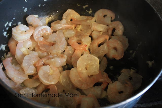 Cooking shrimp in a skillet.