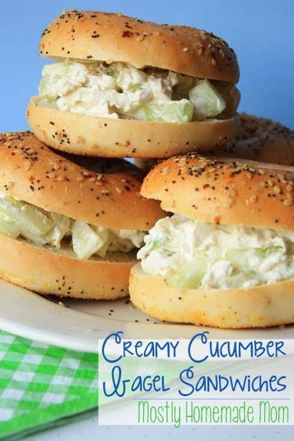 Cucumber bagel sandwiches stacked on each other.