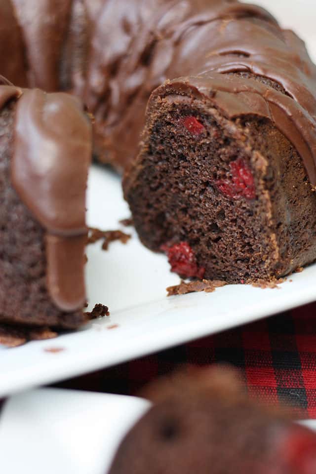 The inside of a cherry chocolate cake on a white plate