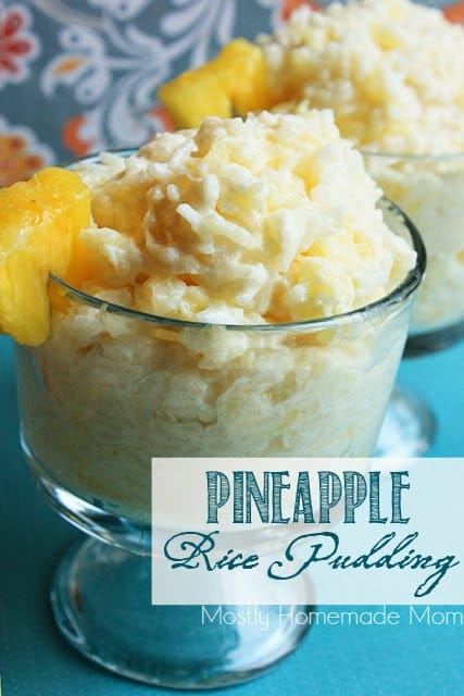 Glass dishes with pineapple rice pudding garnished with a slice of pineapple