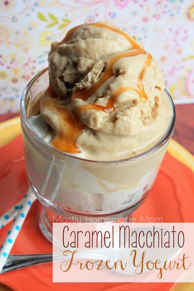 A glass bowl filled with caramel macchiato frozen yogurt and drizzled with caramel on top