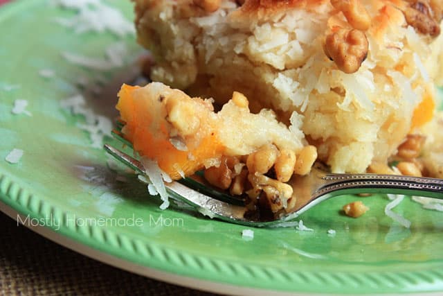 A close up picture of peach dump cake on a fork