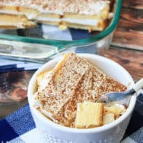 A small dish of easy tiramisu with a full pan in the background
