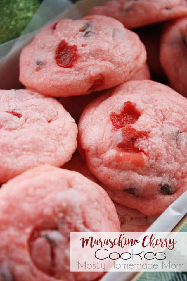 A close up picture of maraschino cherry cookies in a box