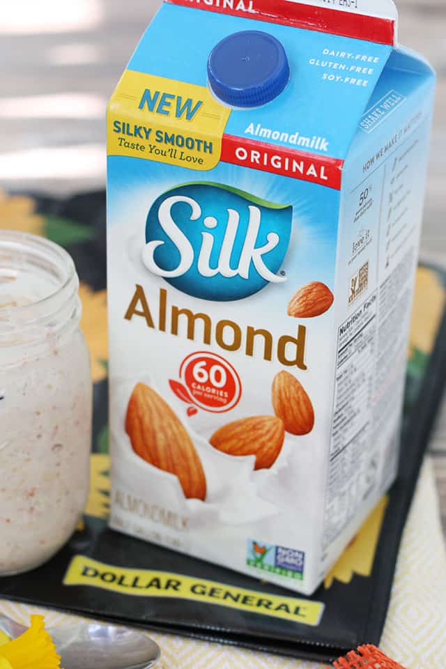 Silk Almond Milk sitting on a reusable shopping bag