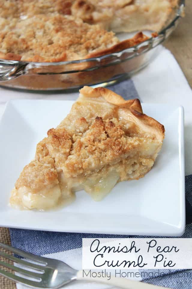 A slice of Pear Pie on a white plate with the whole pie in the background