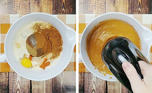 Beating pumpkin pie ingredients in a white bowl with a black hand mixer