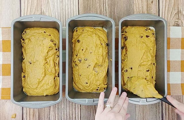 Chocolate chip pumpkin bread batter in loaf pans ready to be baked