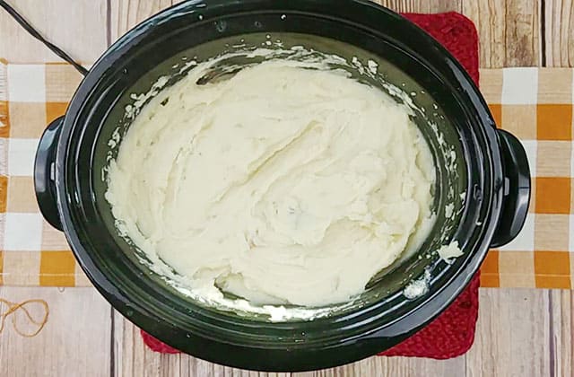 Crockpot mashed potatoes finished and kept warm in a slow cooker