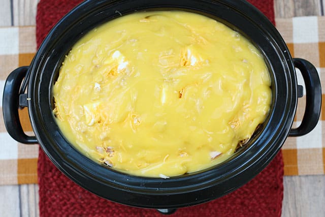 Ingredients for slow cooker scalloped potatoes in a Crockpot